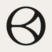 Bayshore logo, a black circular swirl mark on a cream background